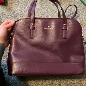 Purple Kate Spade bag.